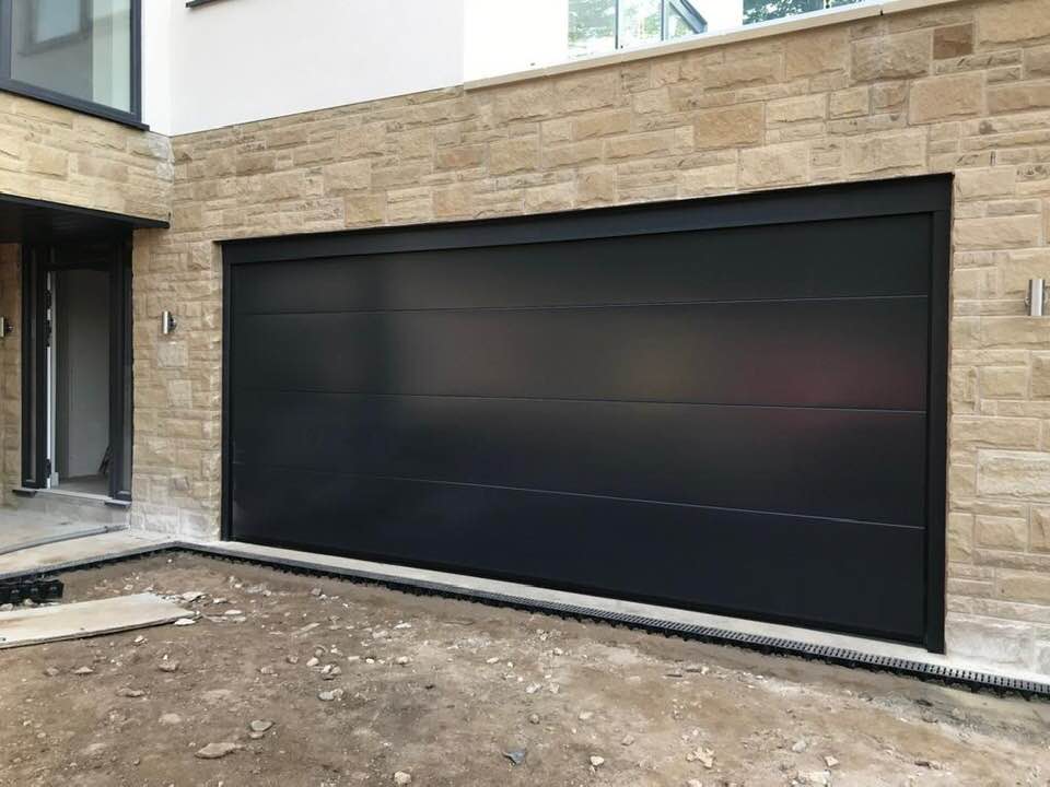 Flat Smooth Panel Garage Door in Black Automatic Sectional