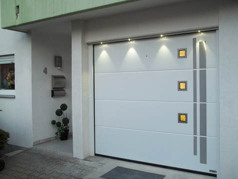 modern side hinged garage doors with porthole stainless steel windows
