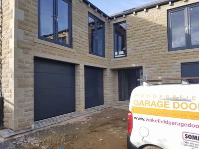 Huddersfield - new build development  - Anthracite Grey Garage Door installations 