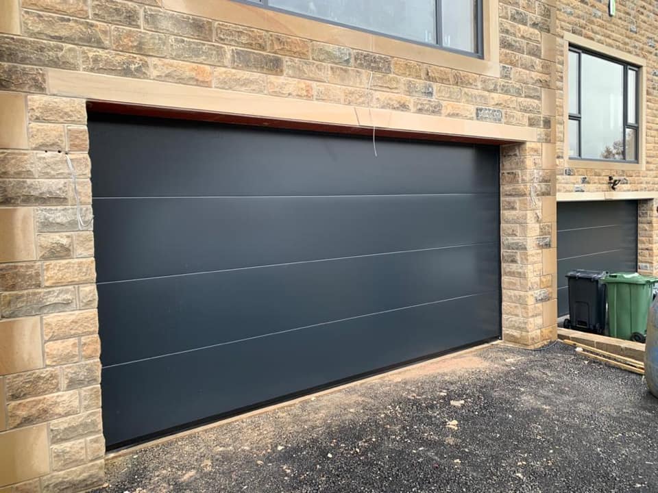 Large Ribbed Sectional Garage Door by LUMINO 